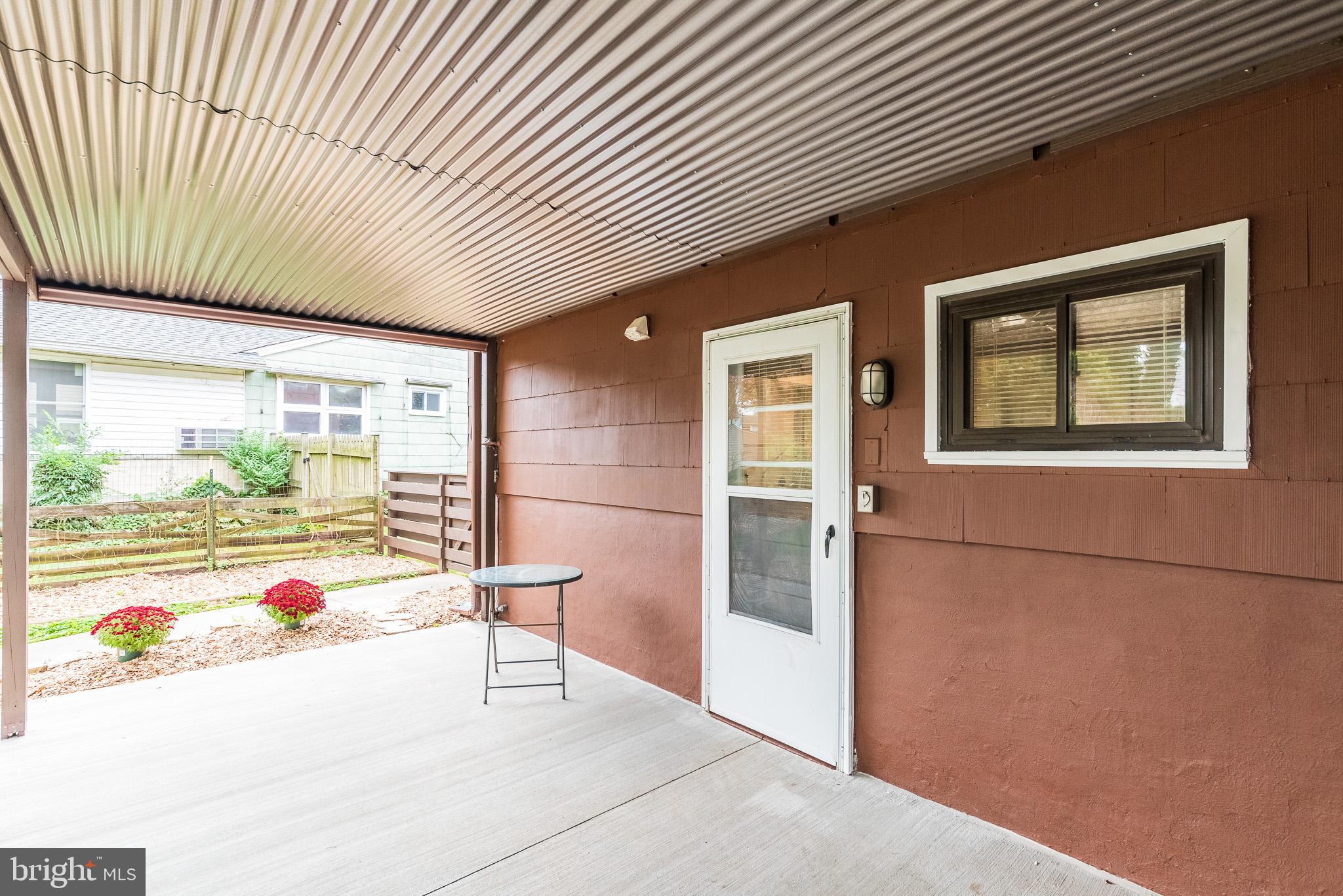 9109 Orbitan Road Baltimore, MD 21234 - Photo 17 of 47 Covered Concrete Patio Area