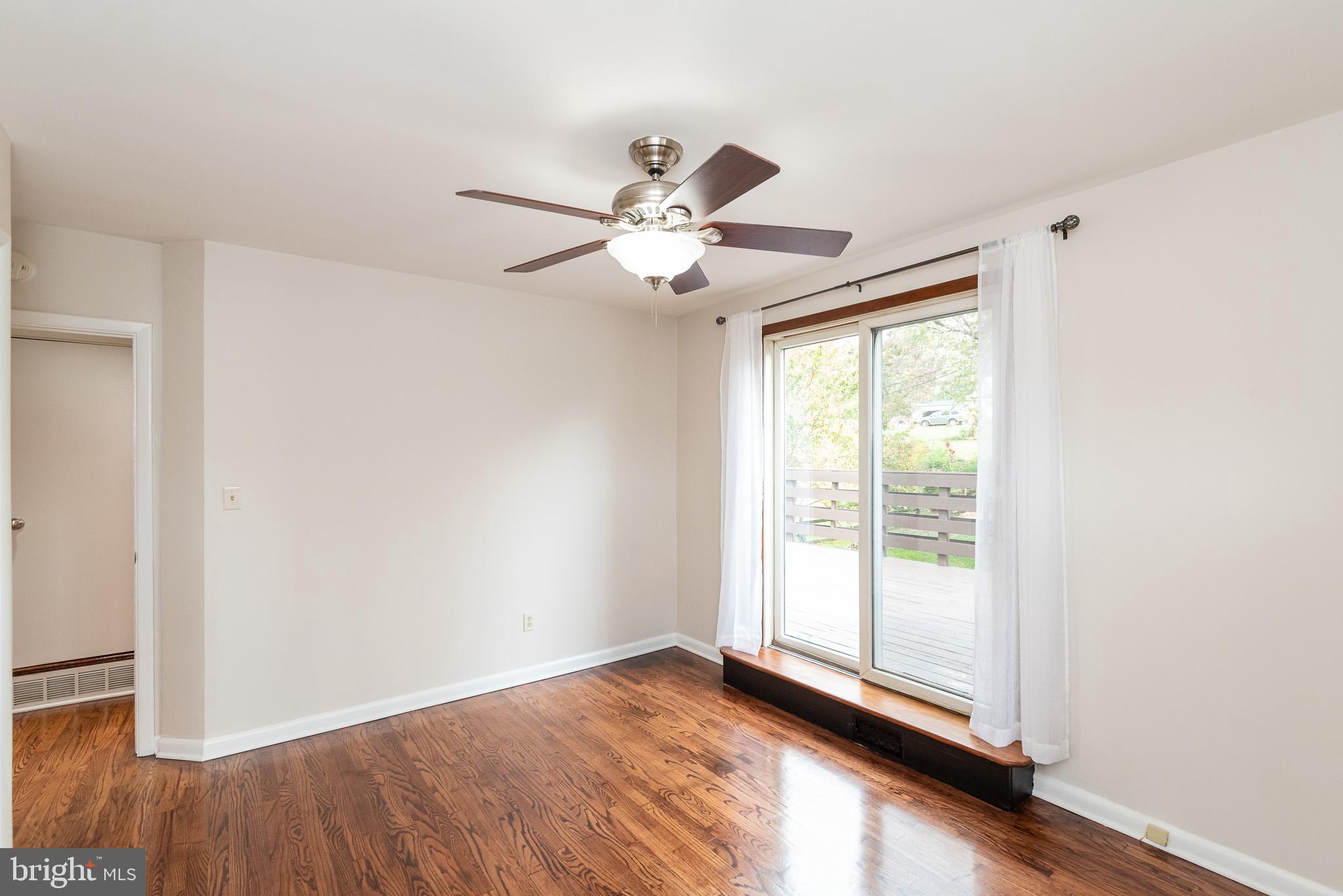 9109 Orbitan Road Baltimore, MD 21234 - Photo 25 of 47 Master Bedroom With Private Deck