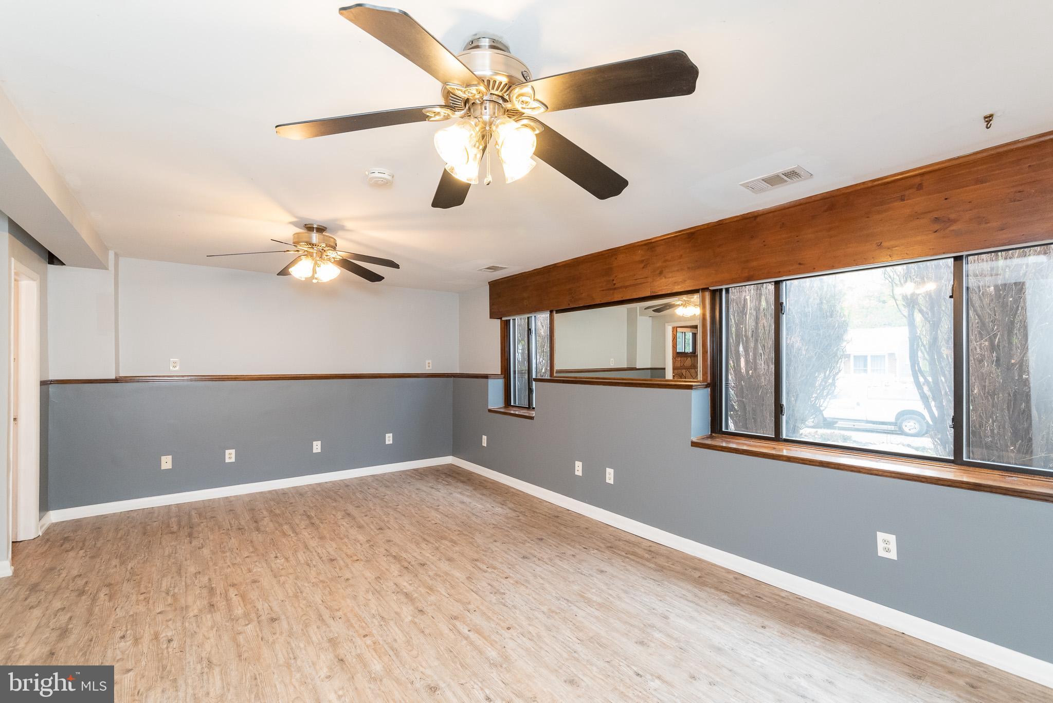 9109 Orbitan Road Baltimore, MD 21234 - Photo 34 of 47 Bright Cheery Lower Level Family Room