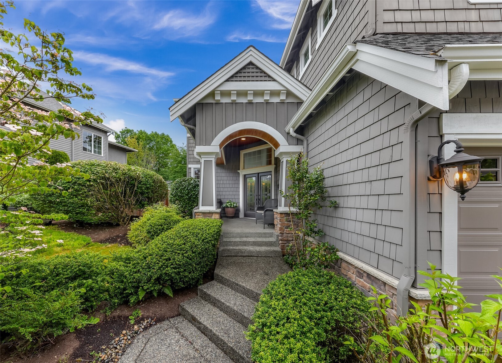 2029 240th Place Southeast Bothell, WA 98021 - Photo 3 of 39 a view of a house with a garden