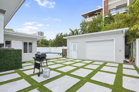 a house view with a backyard space
