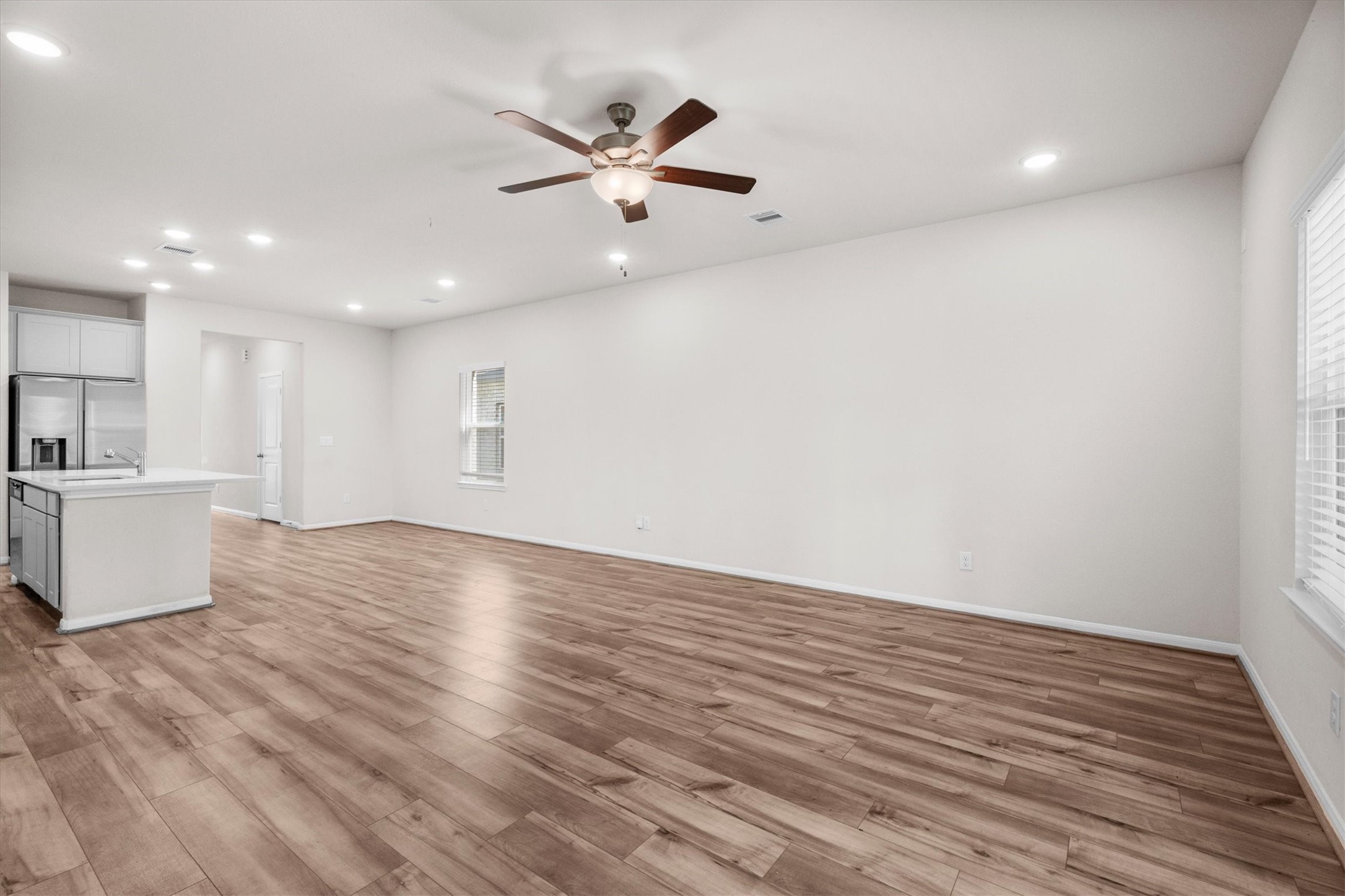 39 Courageous Side Way Magnolia, TX 77354 - Photo 9 of 44 Open sightlines throughout the main living areas create an airy and spacious feel