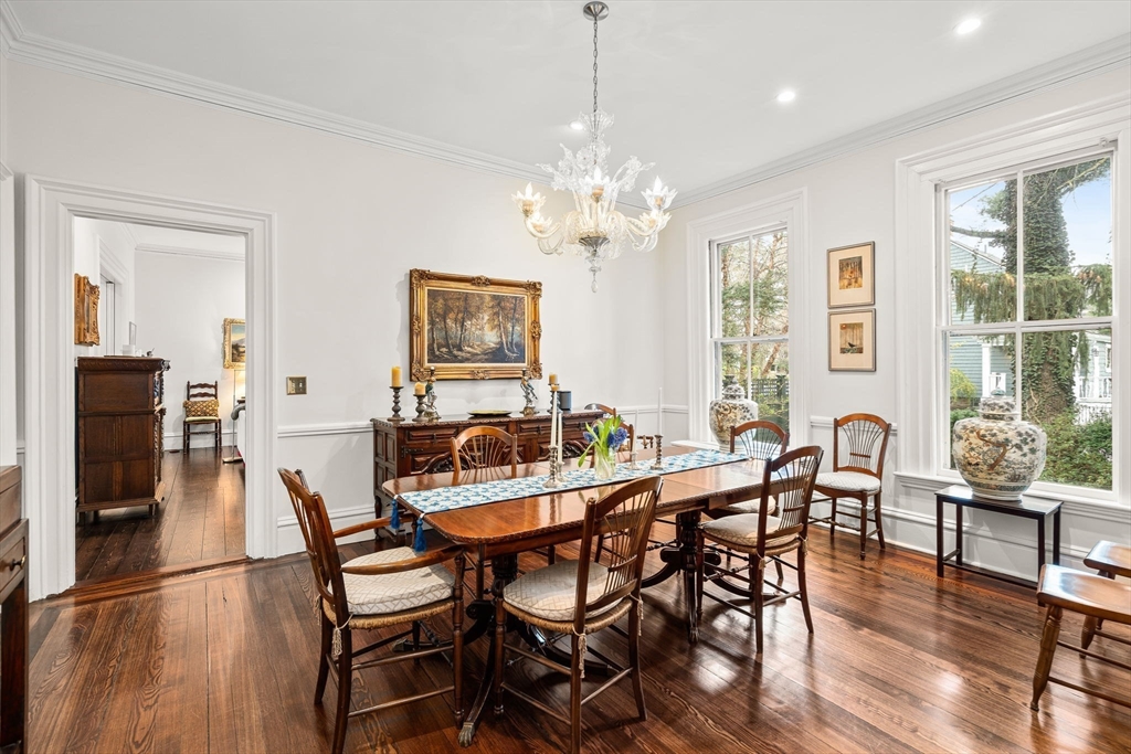 135 Court Street Dedham, MA 02026 - Photo 12 of 40 a view of a dining room with furniture window and wooden floor