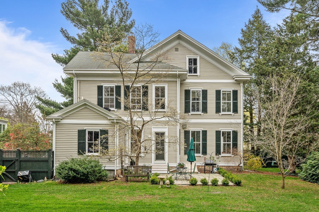 135 Court Street Dedham, MA 02026 - Photo 2 of 40 a front view of a house with a yard