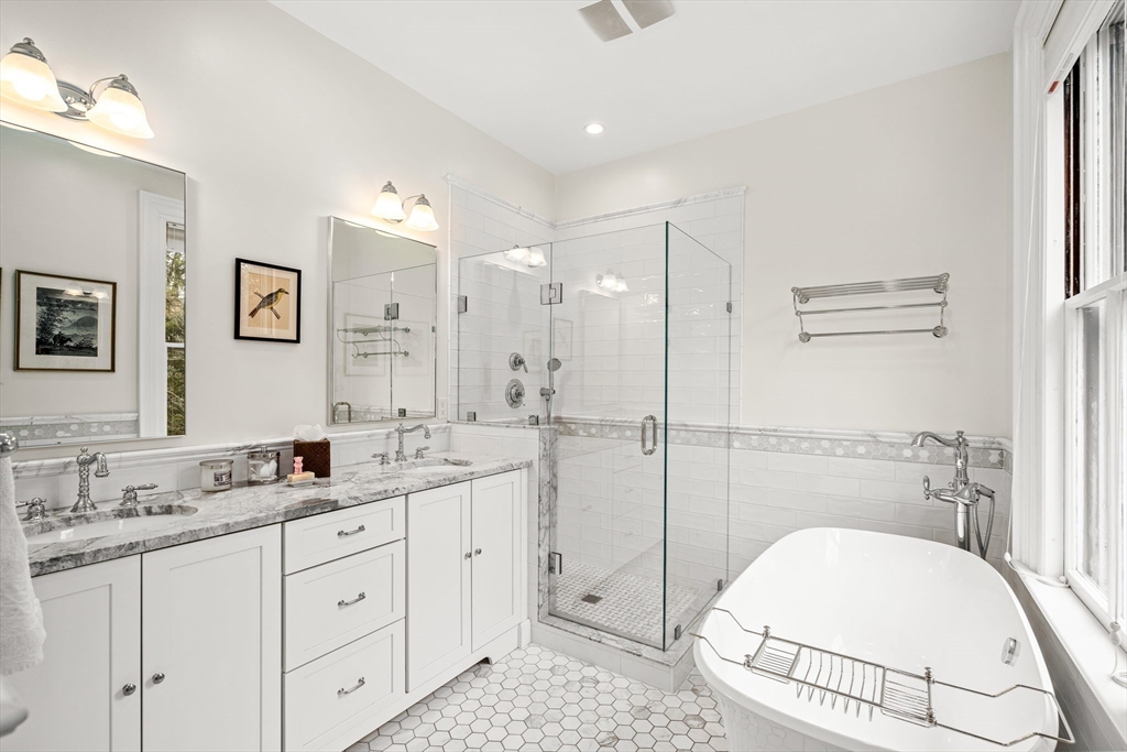 135 Court Street Dedham, MA 02026 - Photo 23 of 40 a bathroom with a sink a toilet and shower