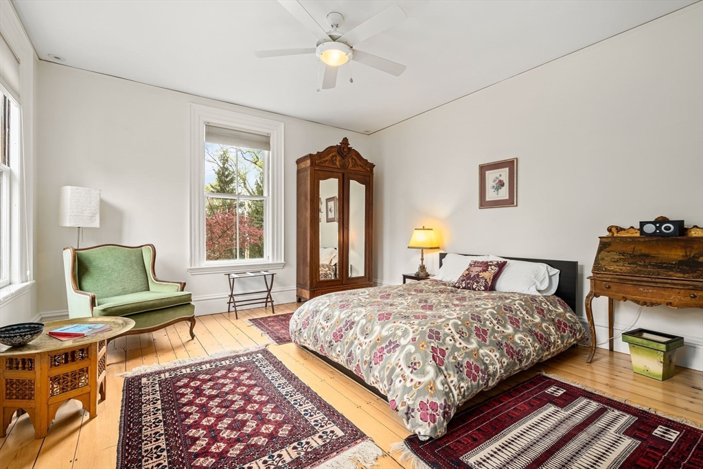 135 Court Street Dedham, MA 02026 - Photo 27 of 40 a bedroom with bed and window