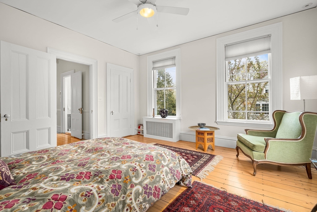 135 Court Street Dedham, MA 02026 - Photo 28 of 40 a bedroom with a bed and a window