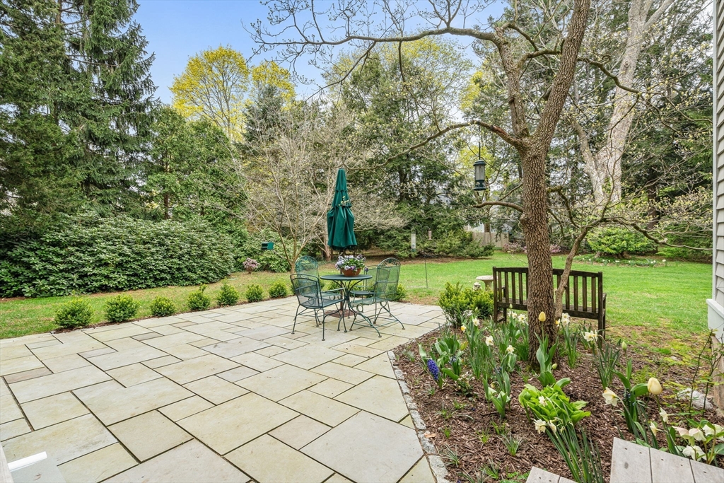 135 Court Street Dedham, MA 02026 - Photo 34 of 40 a view of a lake with a table and chairs