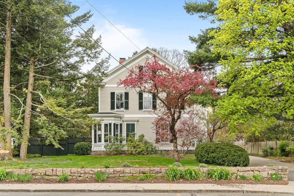135 Court Street Dedham, MA 02026 - Photo 39 of 40 a front view of a house with garden
