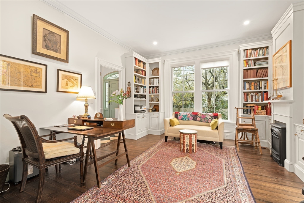 135 Court Street Dedham, MA 02026 - Photo 7 of 40 a living room with furniture a rug and a table