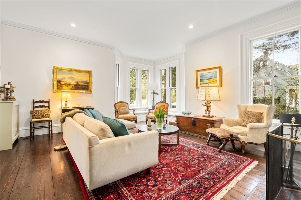 135 Court Street Dedham, MA 02026 - Photo 9 of 40 a living room with furniture and a rug