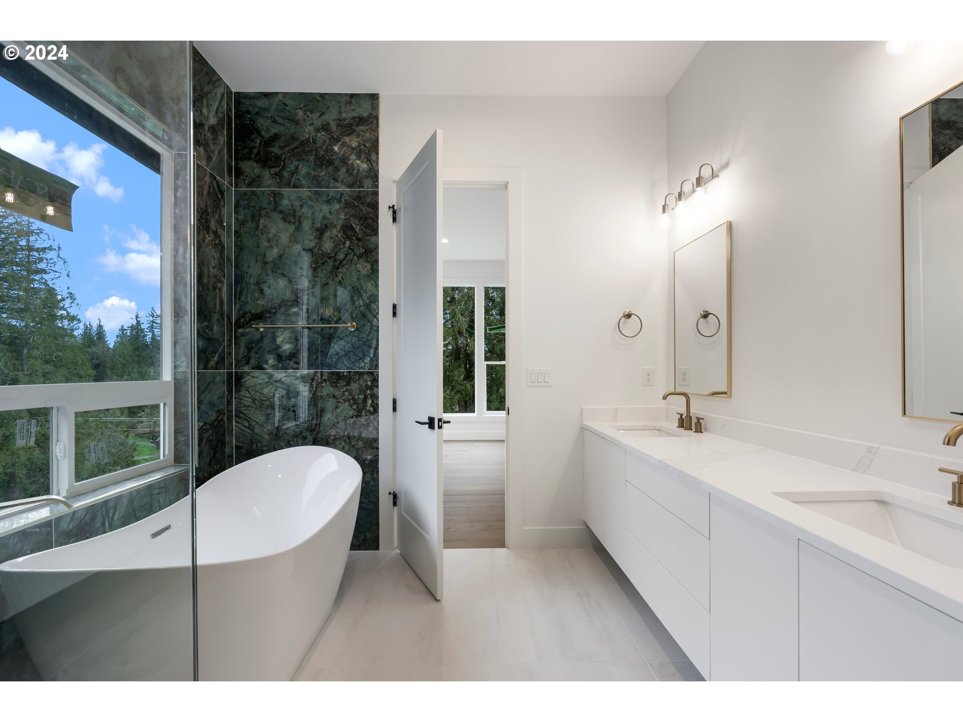 4117 South Hay Field Circle Ridgefield, WA 98642 - Photo 29 of 44 a bathroom with a sink a toilet a mirror and shower