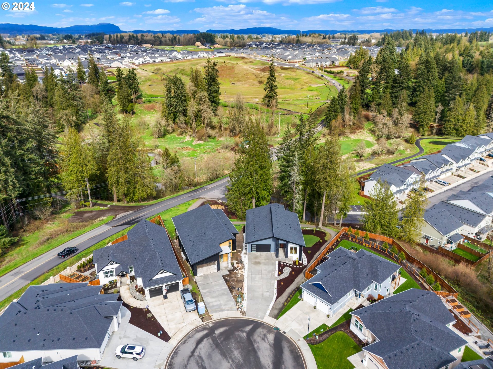 4117 South Hay Field Circle Ridgefield, WA 98642 - Photo 44 of 44 an aerial view of a house with a lake view
