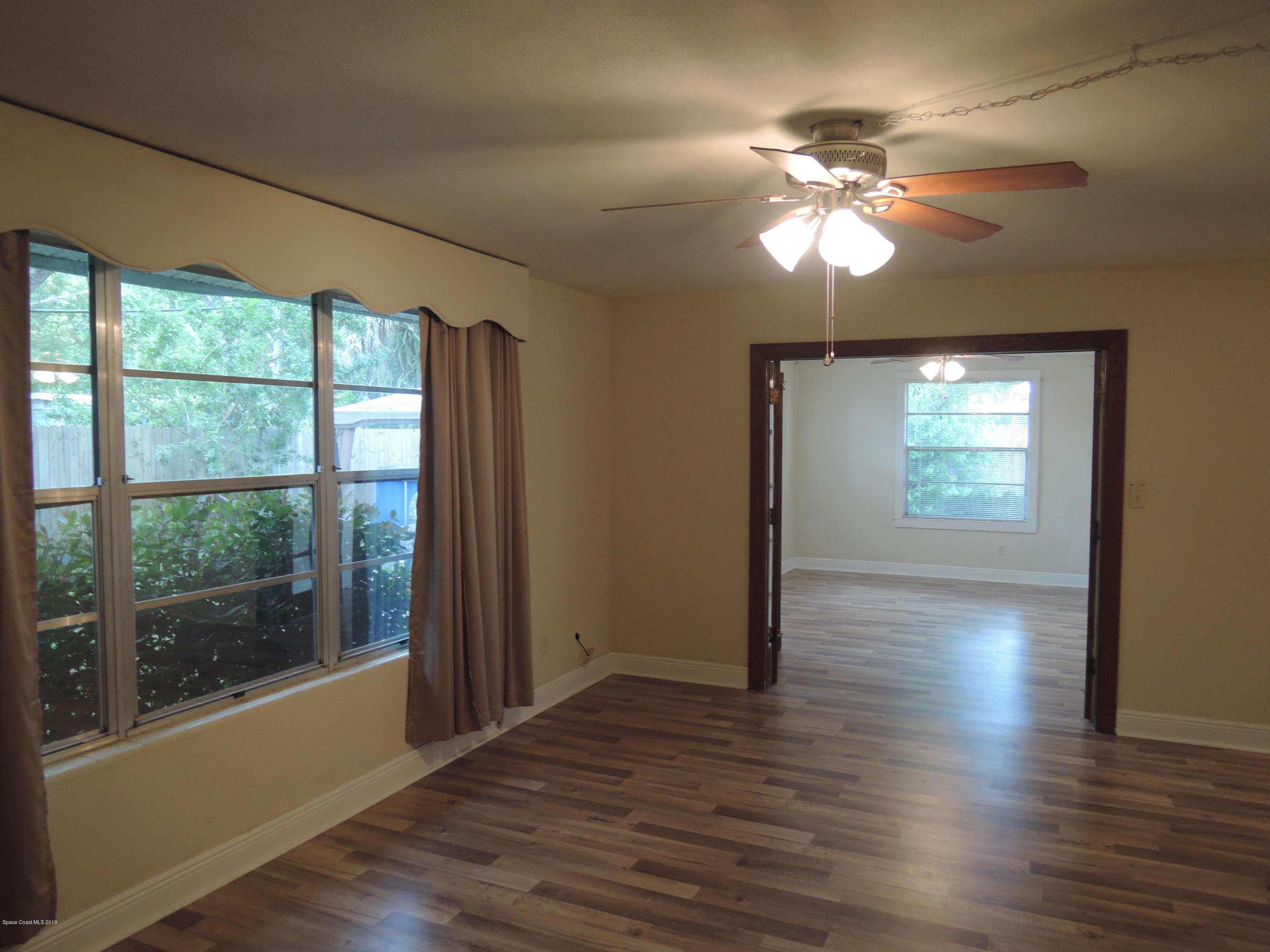 1201 Duke Way Cocoa, FL 32922 - Photo 13 of 25 Living Room to Family Room