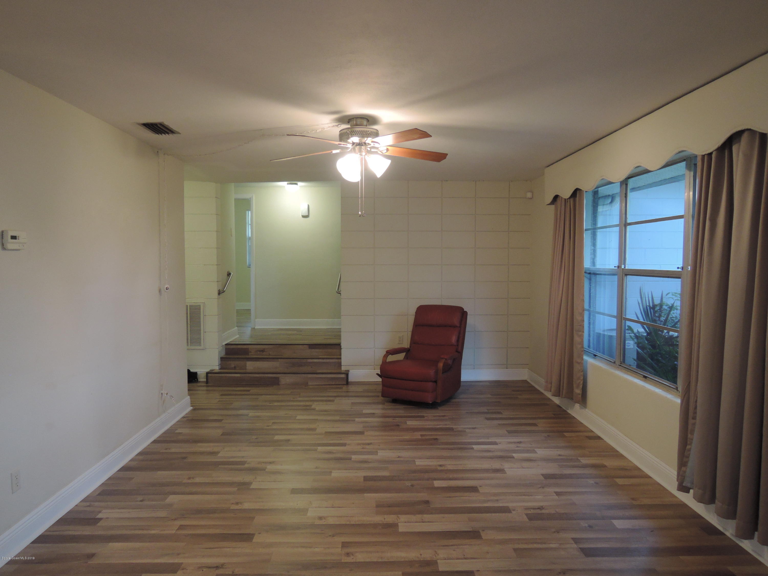 1201 Duke Way Cocoa, FL 32922 - Photo 21 of 25 Living Room to Hallway