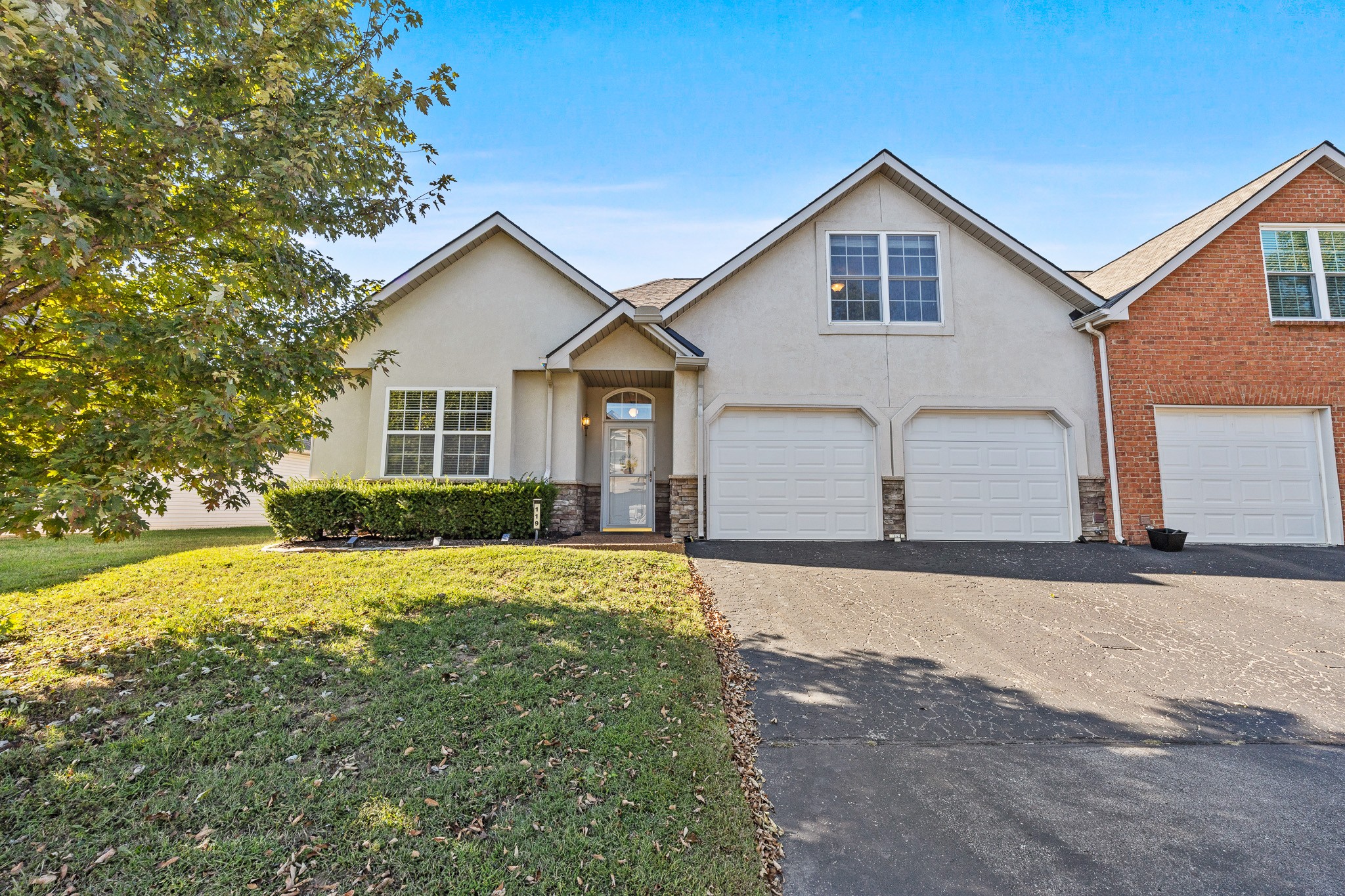 2521 Pennington Bend Road, Unit 119 Nashville, TN 37214 - Photo 1 of 47 a front view of house with yard and trees around