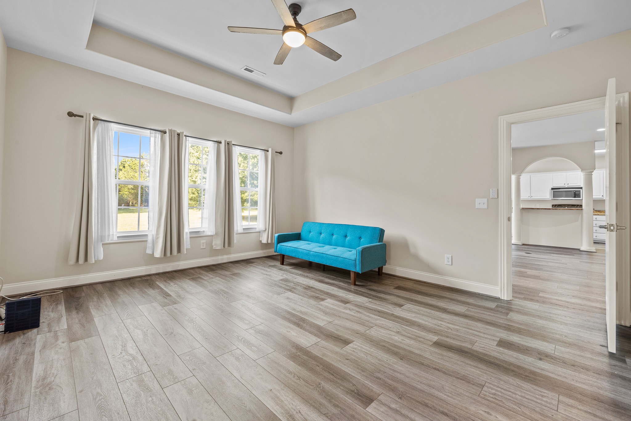 2521 Pennington Bend Road, Unit 119 Nashville, TN 37214 - Photo 23 of 47 a view of an empty room with wooden floor and a window