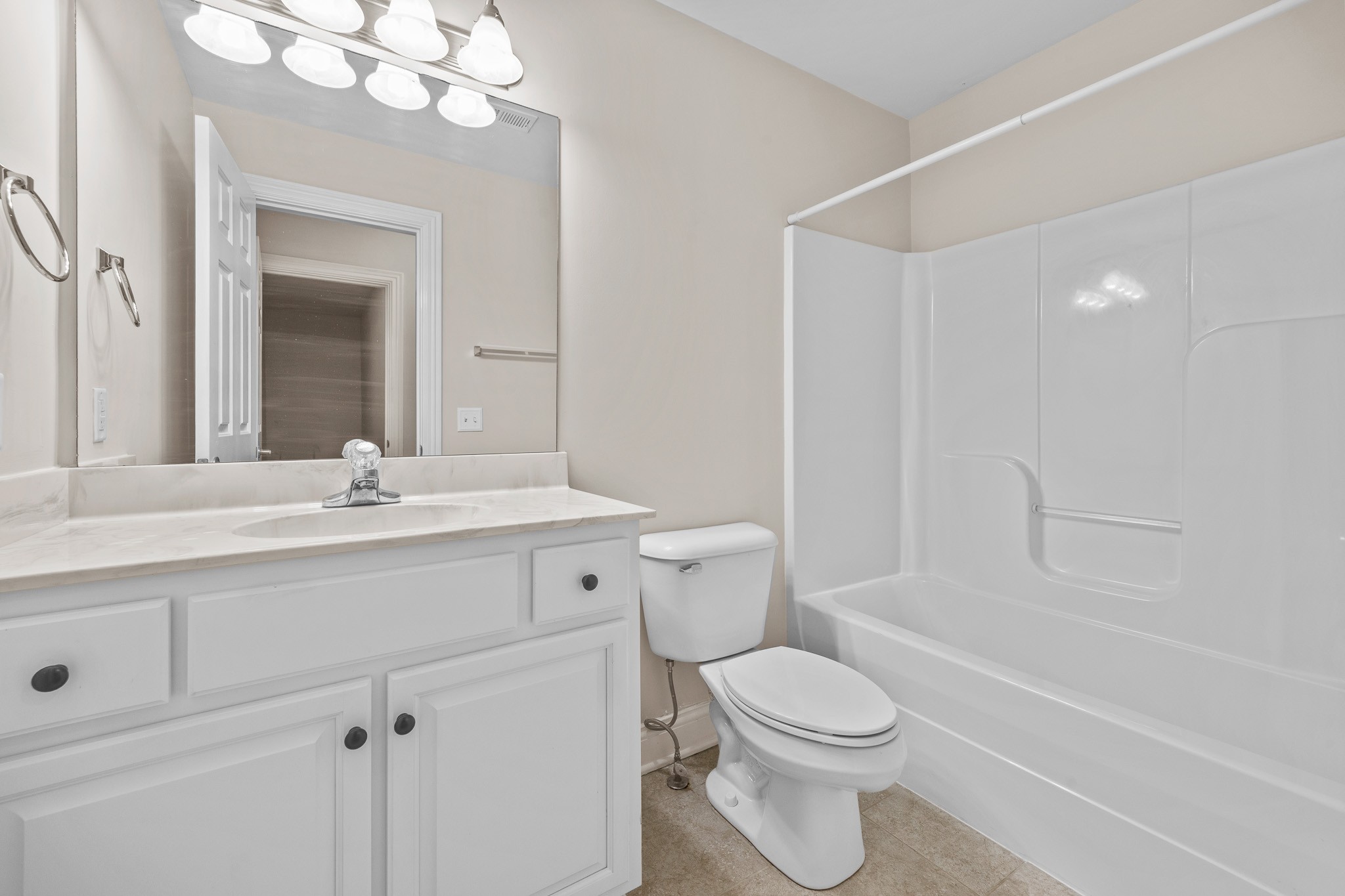 2521 Pennington Bend Road, Unit 119 Nashville, TN 37214 - Photo 30 of 47 a bathroom with a sink a toilet and shower