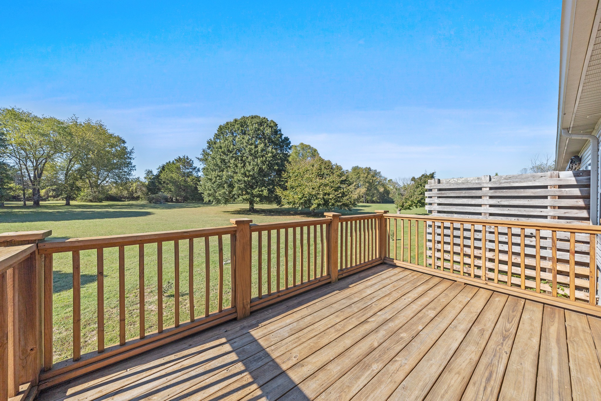 2521 Pennington Bend Road, Unit 119 Nashville, TN 37214 - Photo 33 of 47 a view of balcony with wooden floor and fence