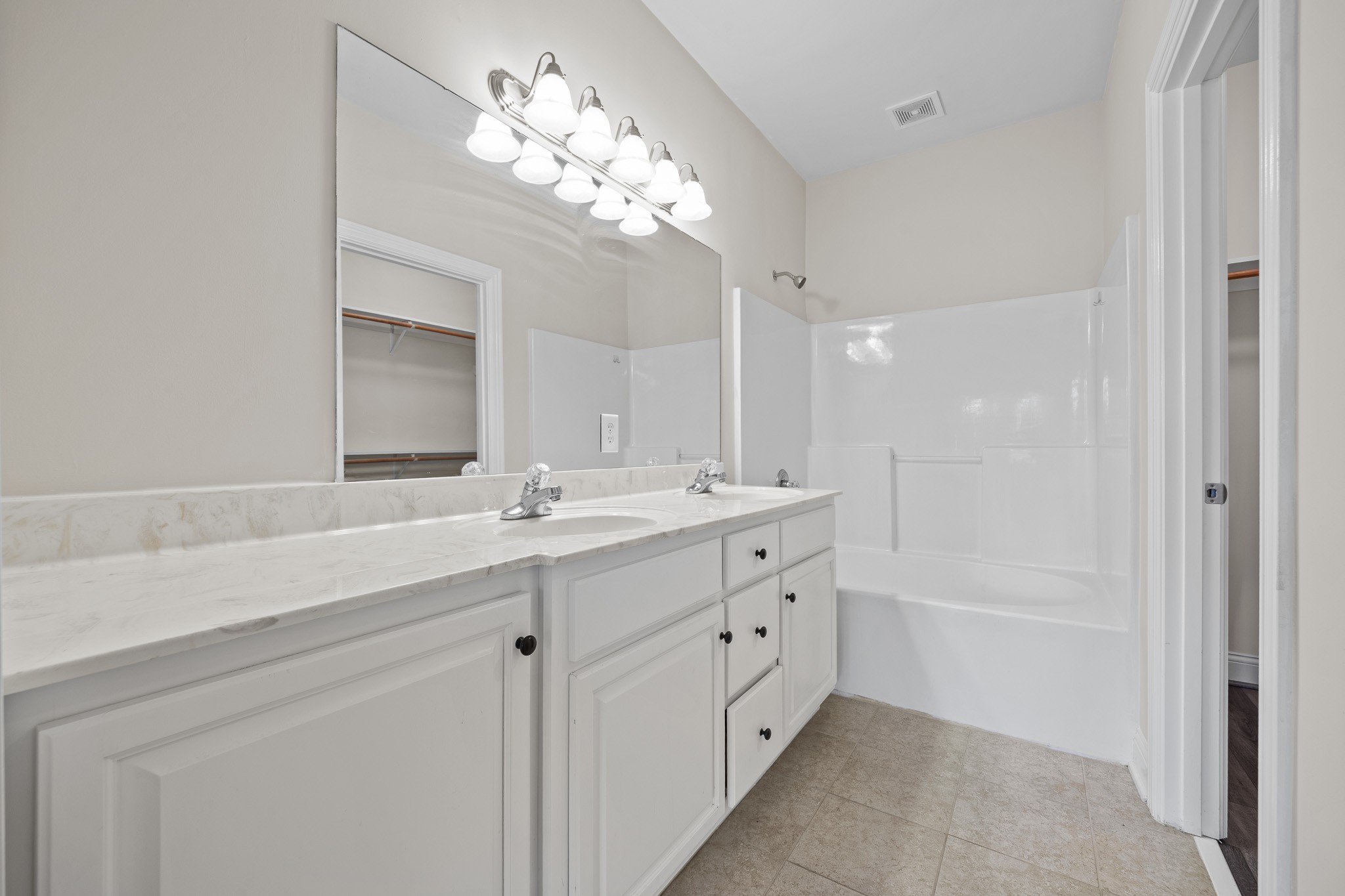 2521 Pennington Bend Road, Unit 119 Nashville, TN 37214 - Photo 39 of 47 a bathroom with a double vanity sink mirror and