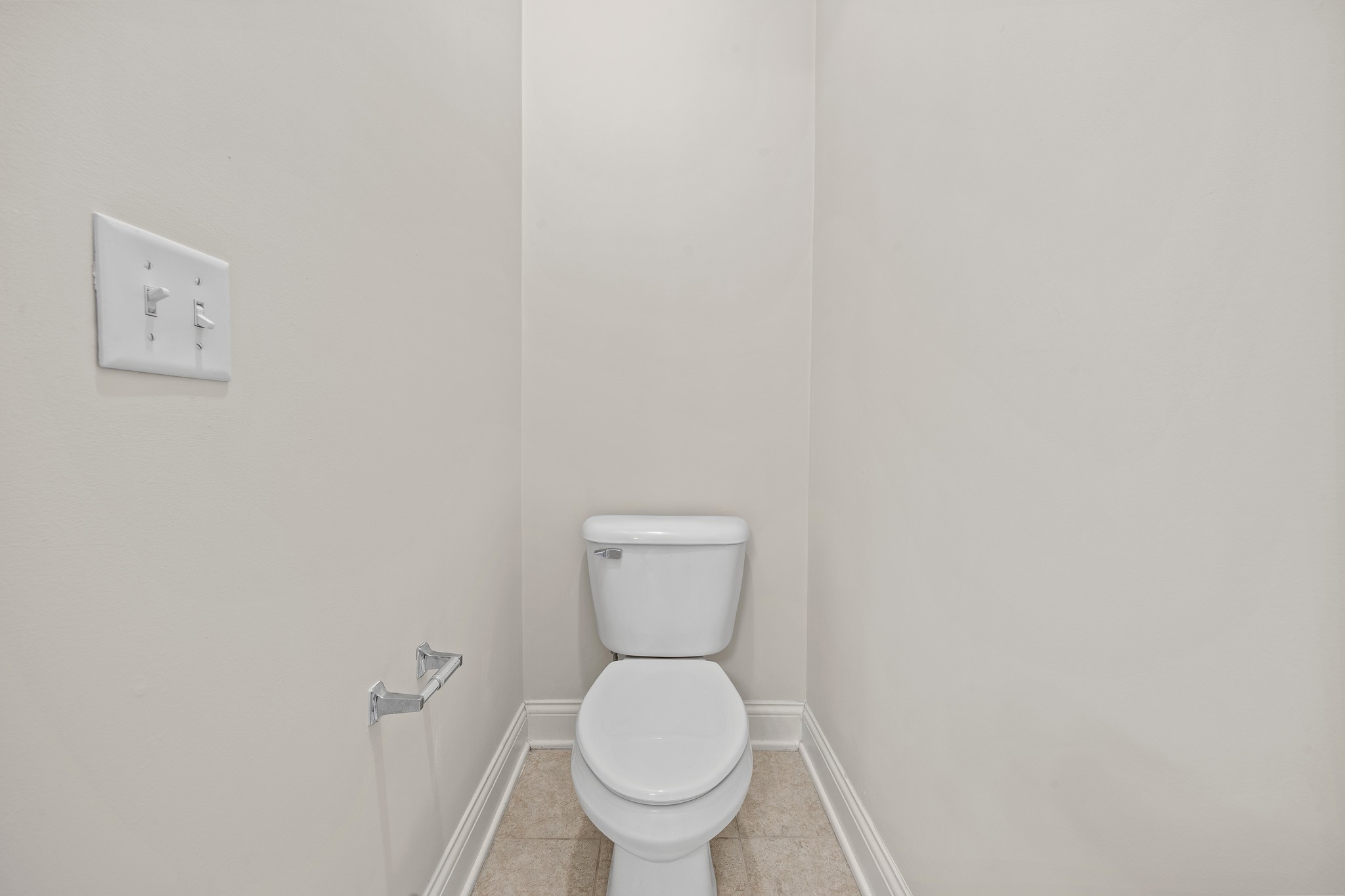 2521 Pennington Bend Road, Unit 119 Nashville, TN 37214 - Photo 40 of 47 a white toilet sitting in a bathroom