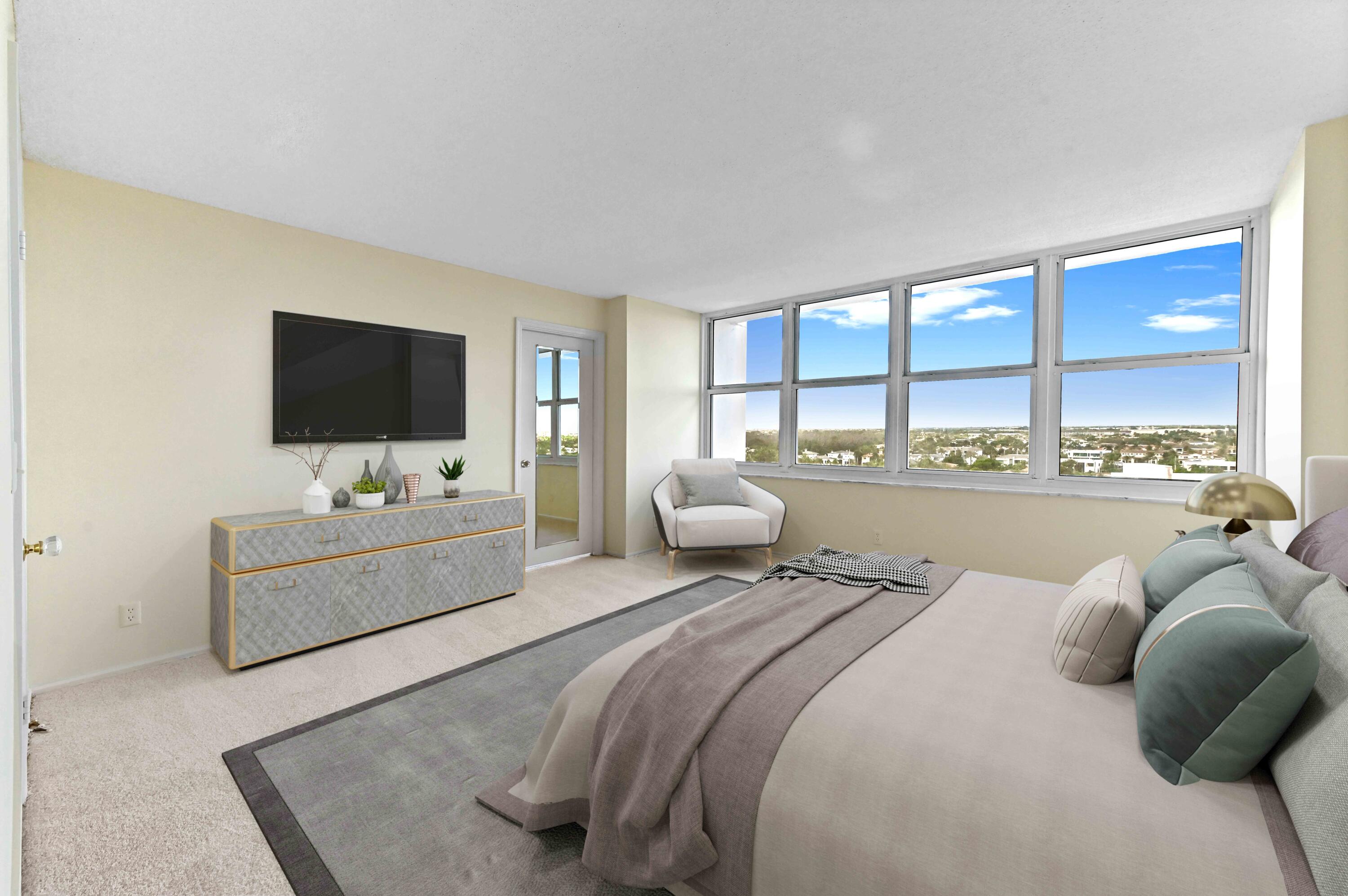 2800 South Ocean Boulevard, Unit 11M Boca Raton, FL 33432 - Photo 23 of 65 a large bedroom with a bed and large window