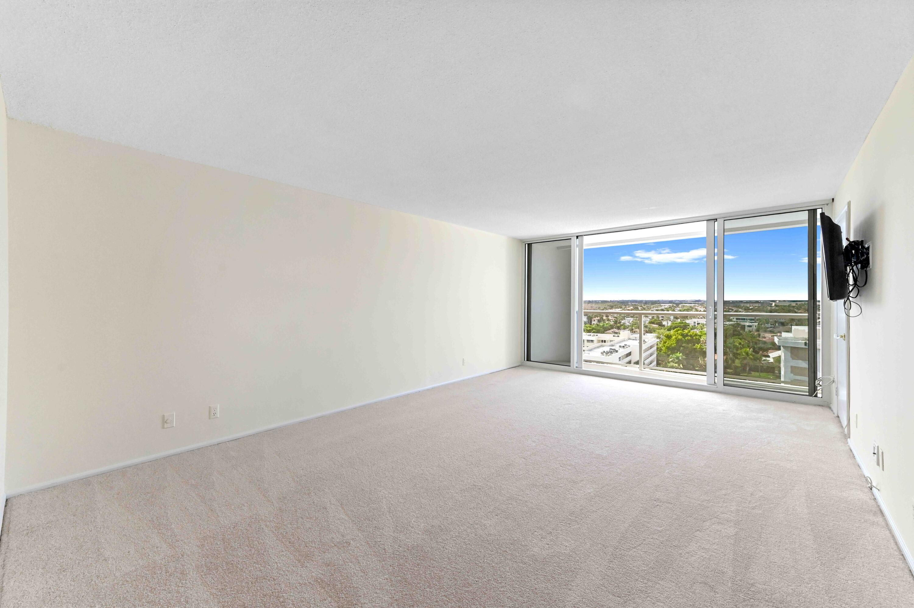 2800 South Ocean Boulevard, Unit 11M Boca Raton, FL 33432 - Photo 28 of 65 an empty room with a large window