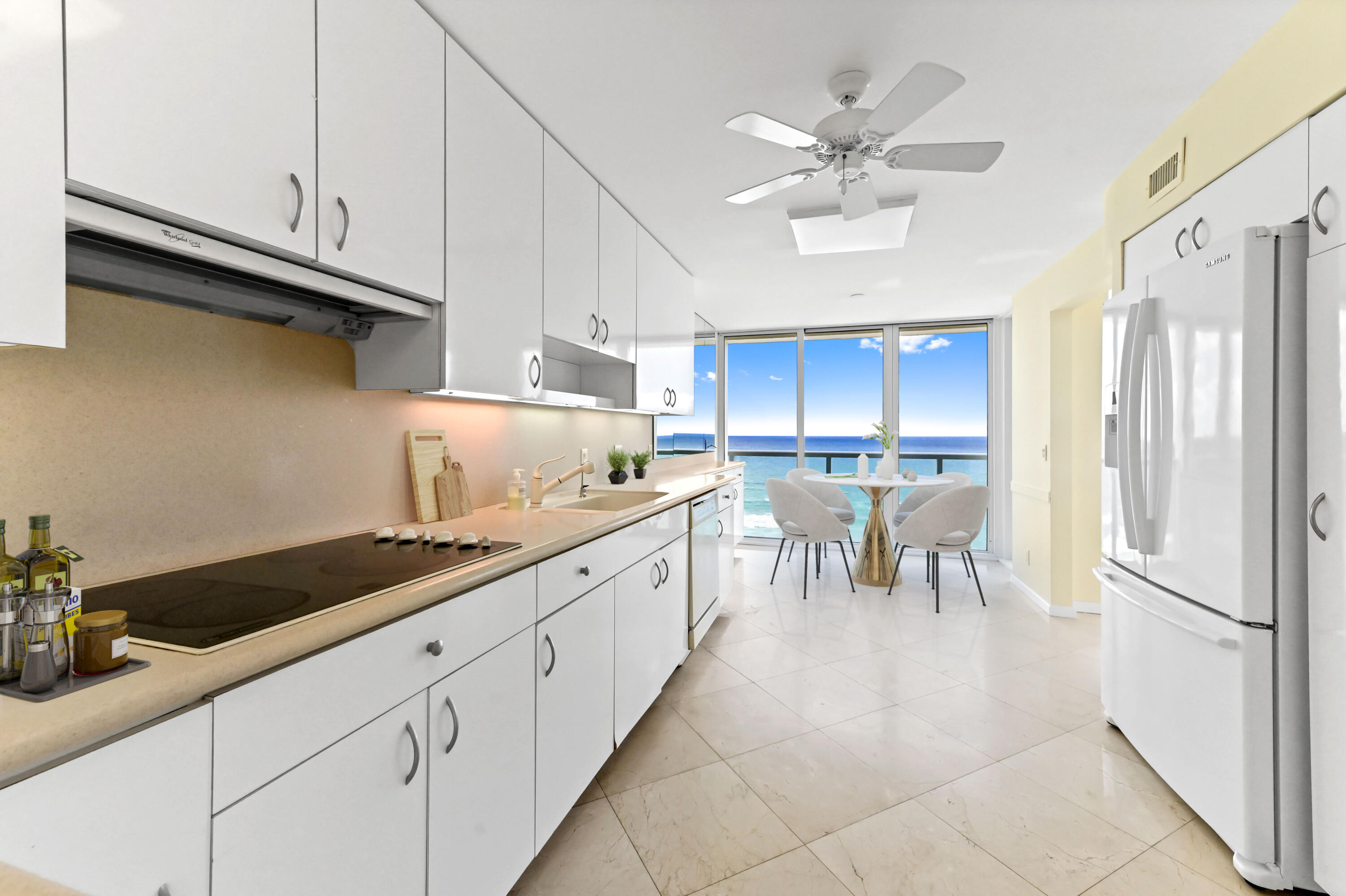 2800 South Ocean Boulevard, Unit 11M Boca Raton, FL 33432 - Photo 9 of 65 a kitchen with stainless steel appliances granite countertop a sink a stove and cabinets