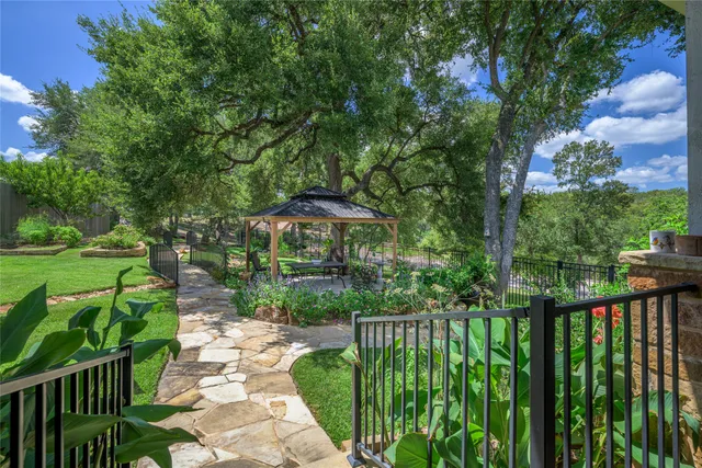 an aerial view of residential house and outdoor space