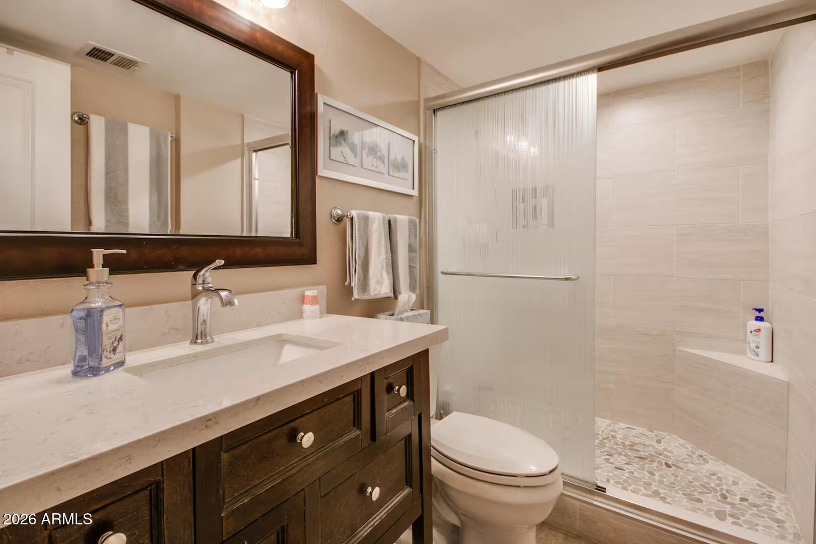 7625 East Camelback Road, Unit B133 Scottsdale, AZ 85251 - Photo 23 of 30 a bathroom with a granite countertop sink toilet and shower