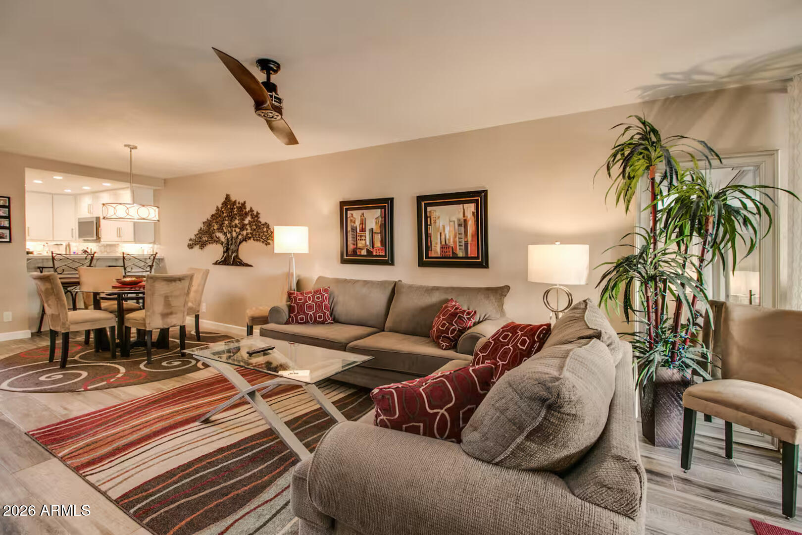 7625 East Camelback Road, Unit B133 Scottsdale, AZ 85251 - Photo 6 of 30 a living room with furniture and a wooden floor