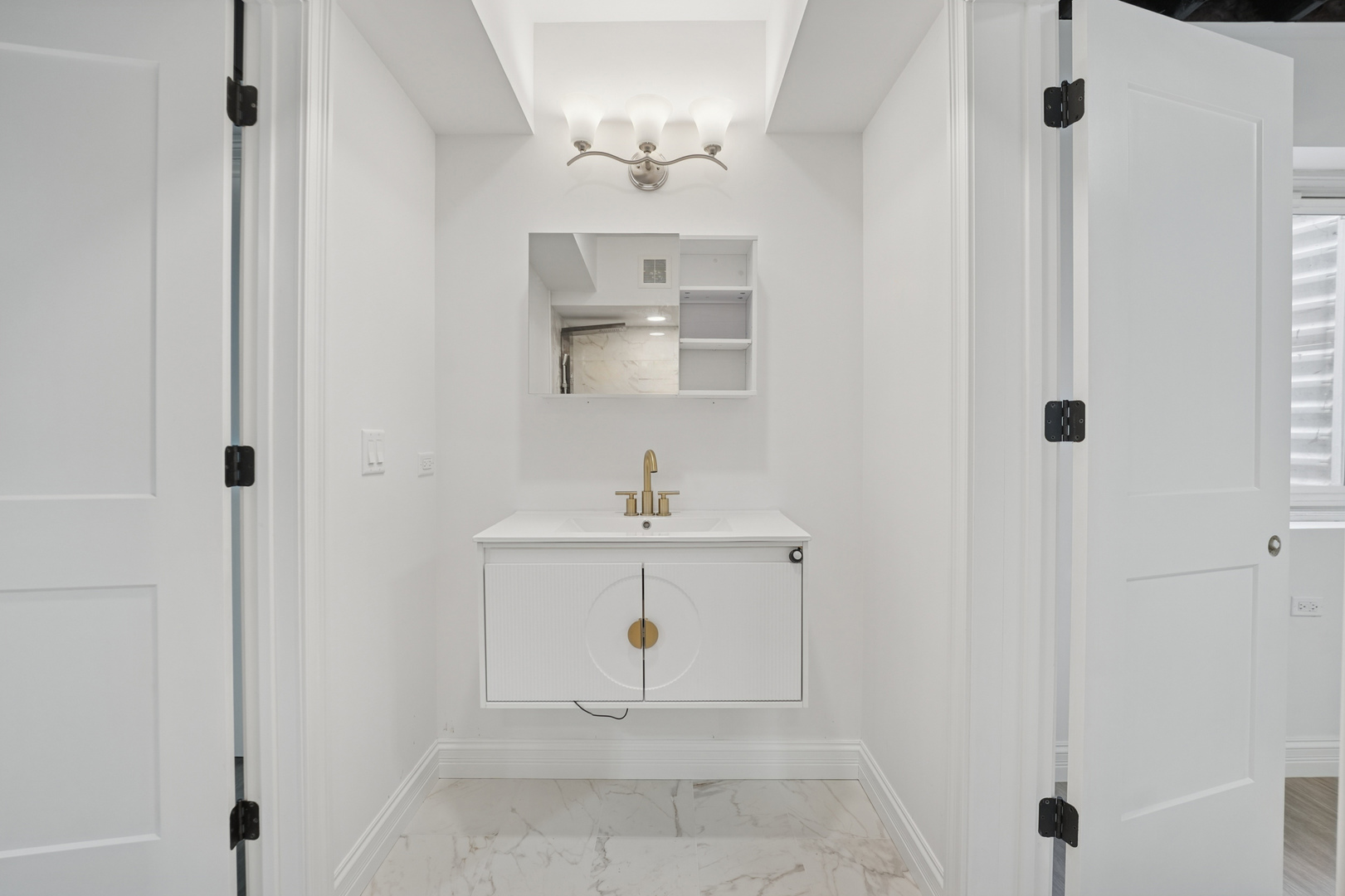 1133 Fortuna Avenue Park Ridge, IL 60068 - Photo 31 of 41 a bathroom with a sink a mirror and a shower