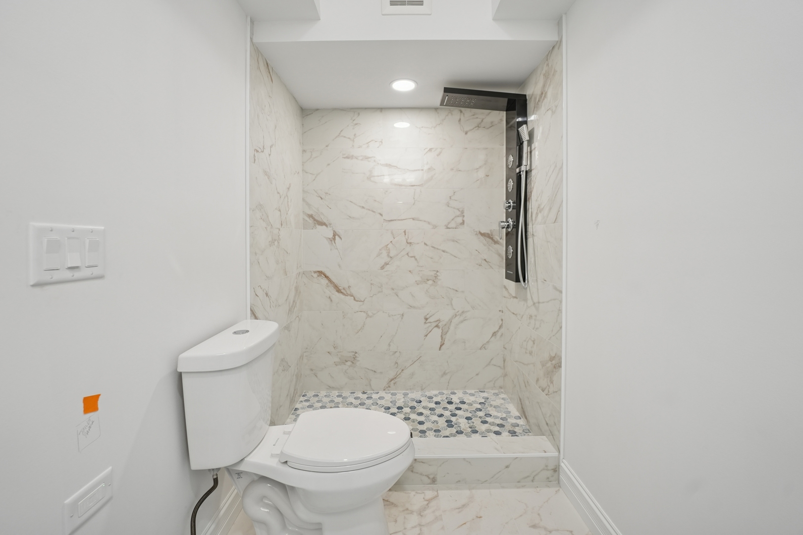 1133 Fortuna Avenue Park Ridge, IL 60068 - Photo 32 of 41 a bathroom with a toilet and a shower