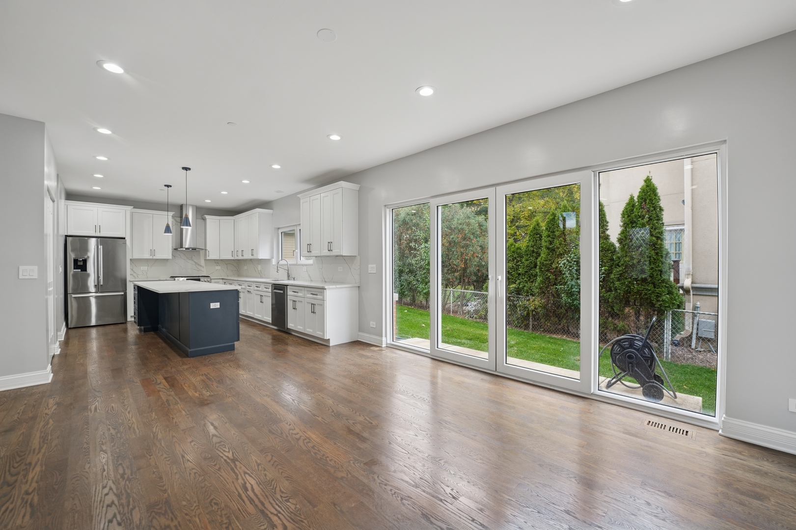 1133 Fortuna Avenue Park Ridge, IL 60068 - Photo 8 of 41 a large kitchen with stainless steel appliances granite countertop a large counter top a large window and a kitchen view