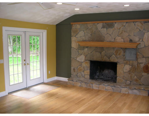39 Dexter Rock Road Lincoln, RI 02865 - Photo 6 of 16 a view of a livingroom with a fireplace