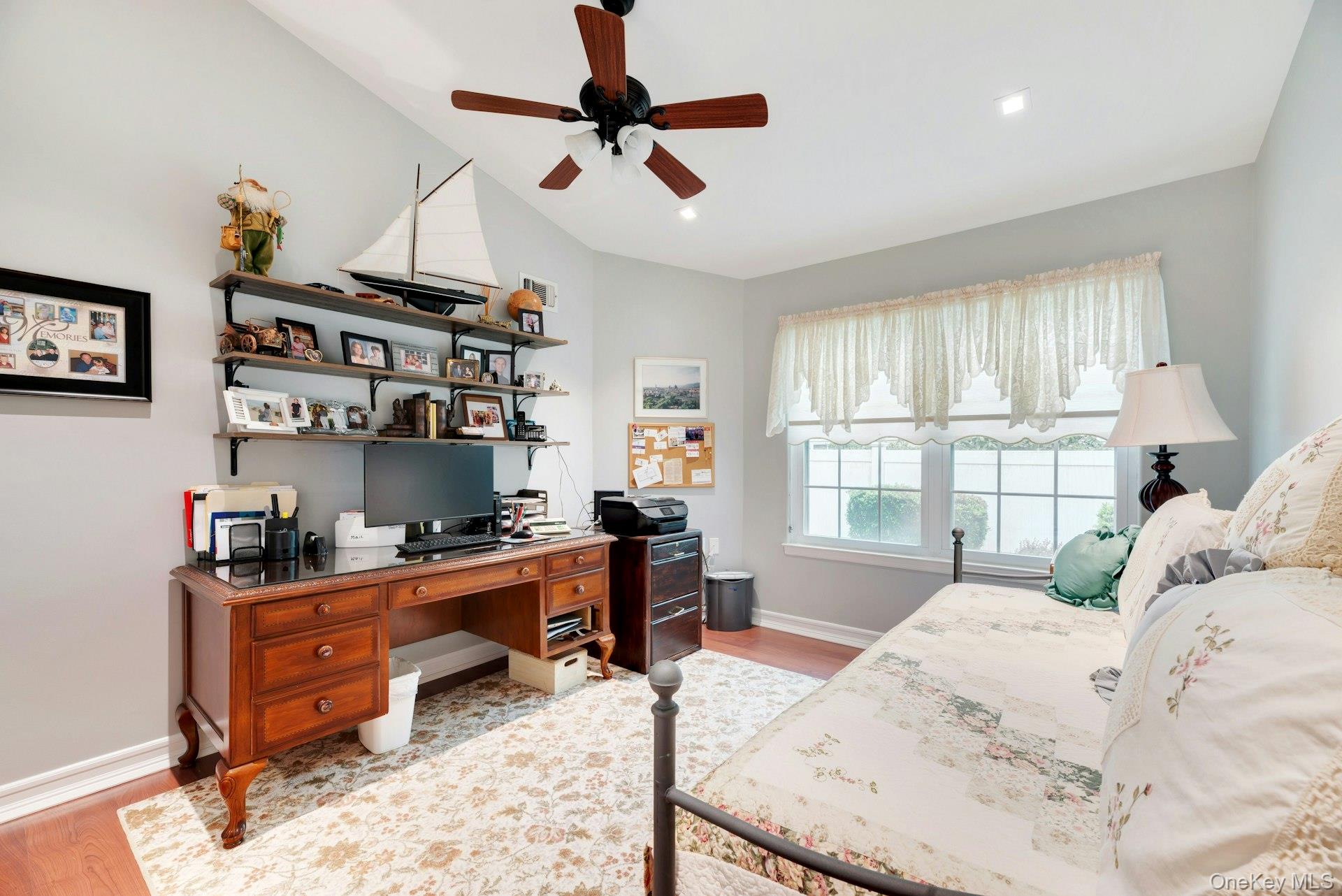 104 Glen Drive Ridge, NY 11961 - Photo 16 of 25 a bed room with a bed and a window