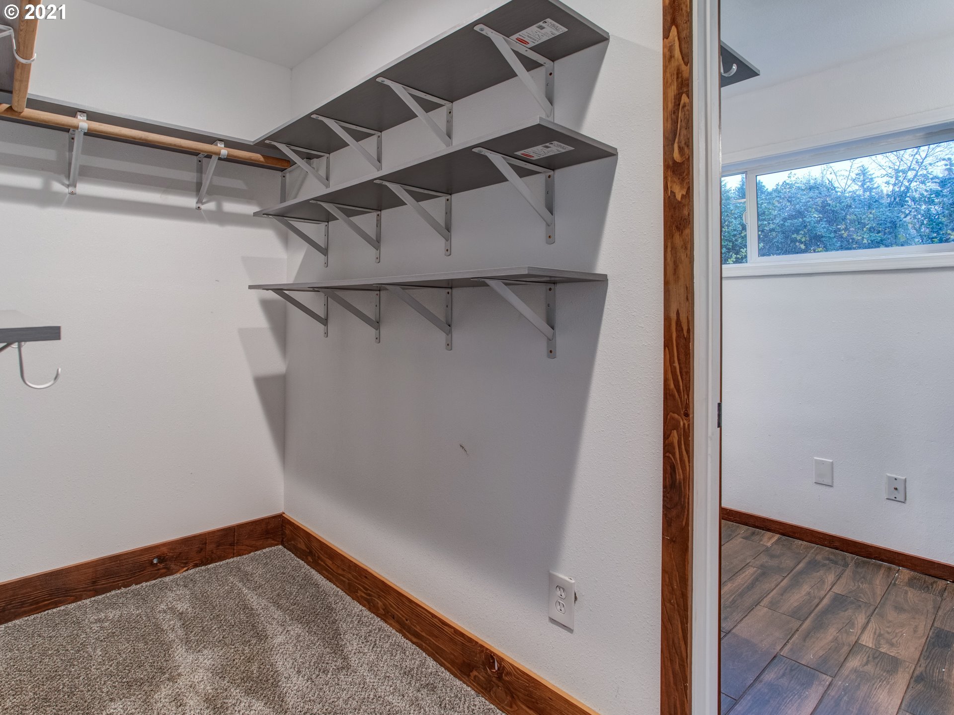 2517 Northeast 199th Street Ridgefield, WA 98642 - Photo 16 of 25 a view of a room with wooden floor
