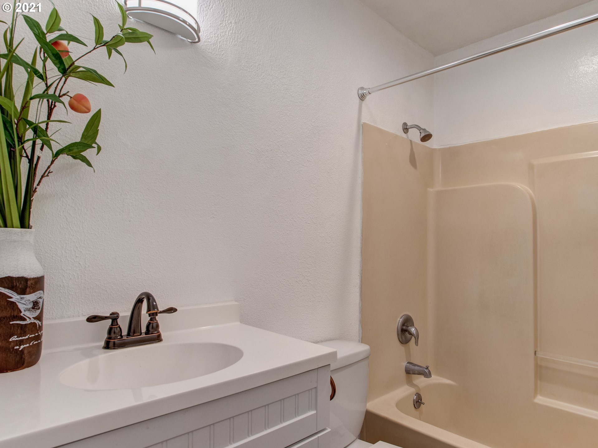 2517 Northeast 199th Street Ridgefield, WA 98642 - Photo 21 of 25 a bathroom with a sink a bathtub and a shower