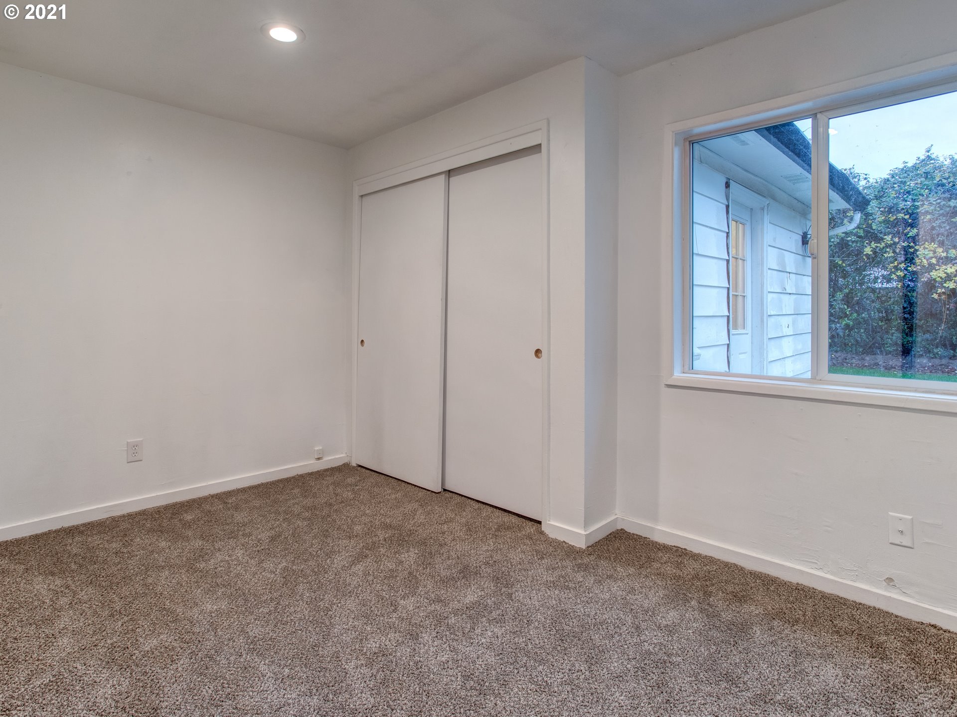 2517 Northeast 199th Street Ridgefield, WA 98642 - Photo 23 of 25 a view of an empty room with a window