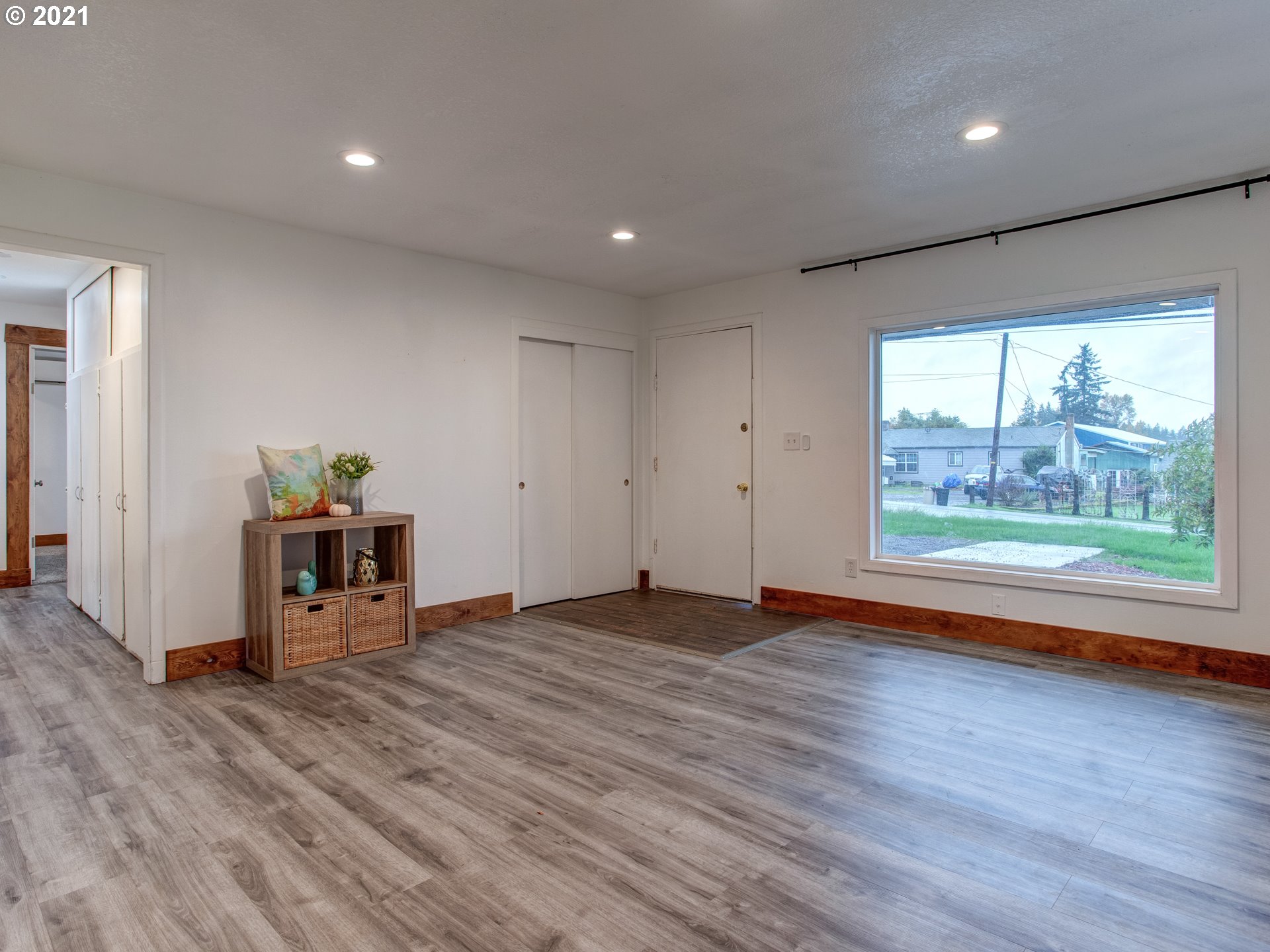 2517 Northeast 199th Street Ridgefield, WA 98642 - Photo 4 of 25 a view of empty room with wooden floor and fan