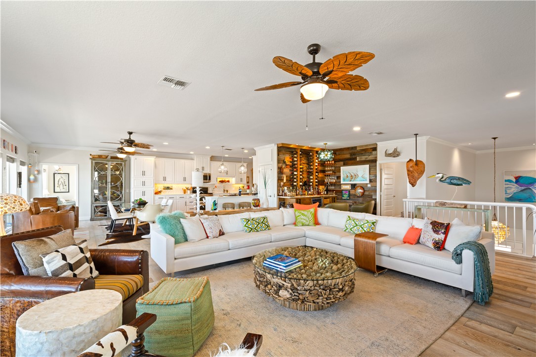 13 Sea Shell Shores Rockport, TX 78382 - Photo 11 of 40 a living room with furniture kitchen view and a large window