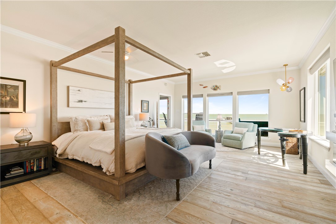 13 Sea Shell Shores Rockport, TX 78382 - Photo 19 of 40 a bedroom with furniture a bed and a chandelier