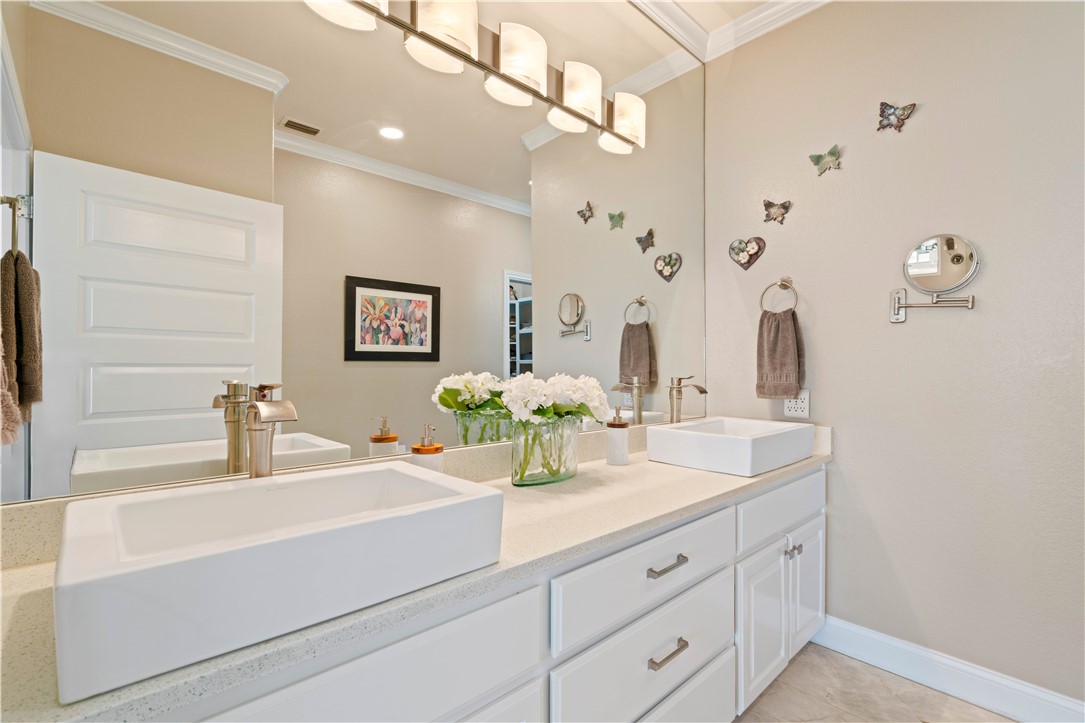 13 Sea Shell Shores Rockport, TX 78382 - Photo 20 of 40 a bathroom with a sink and a mirror