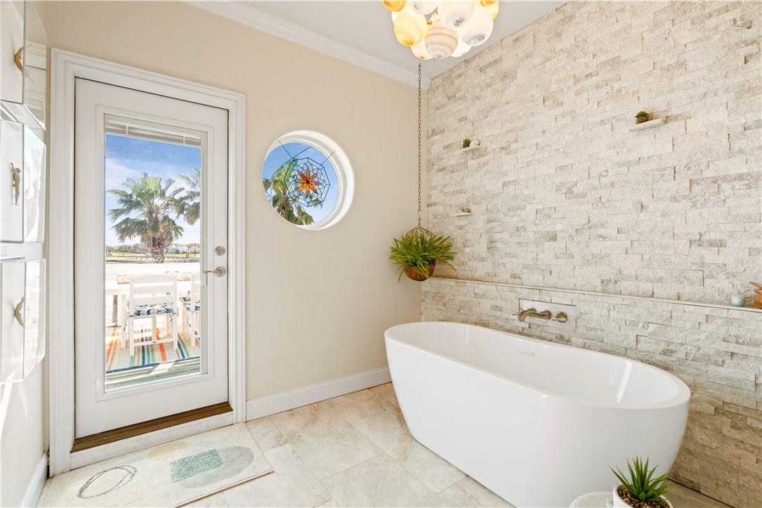 13 Sea Shell Shores Rockport, TX 78382 - Photo 21 of 40 a white bath tub sitting next to a white sink