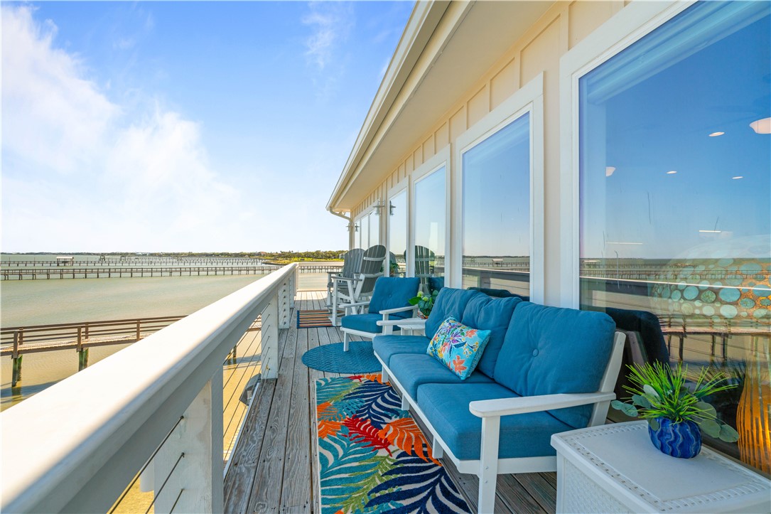 13 Sea Shell Shores Rockport, TX 78382 - Photo 25 of 40 a balcony with furniture and a potted plant