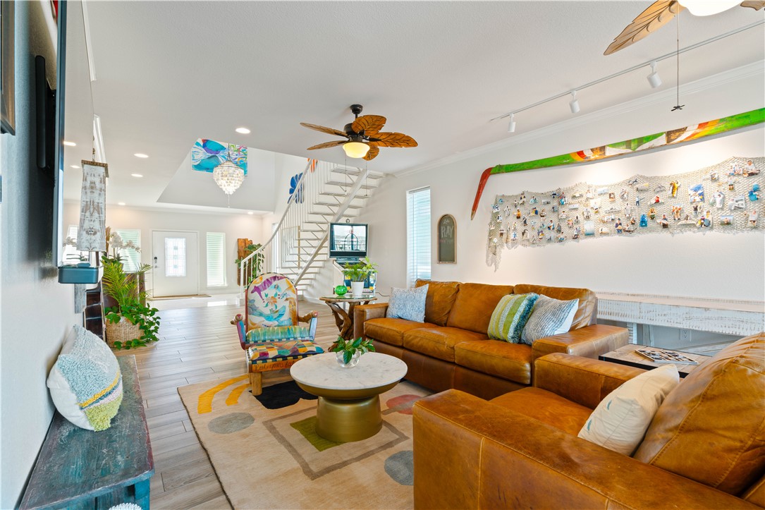13 Sea Shell Shores Rockport, TX 78382 - Photo 29 of 40 a living room with furniture flowers and a table