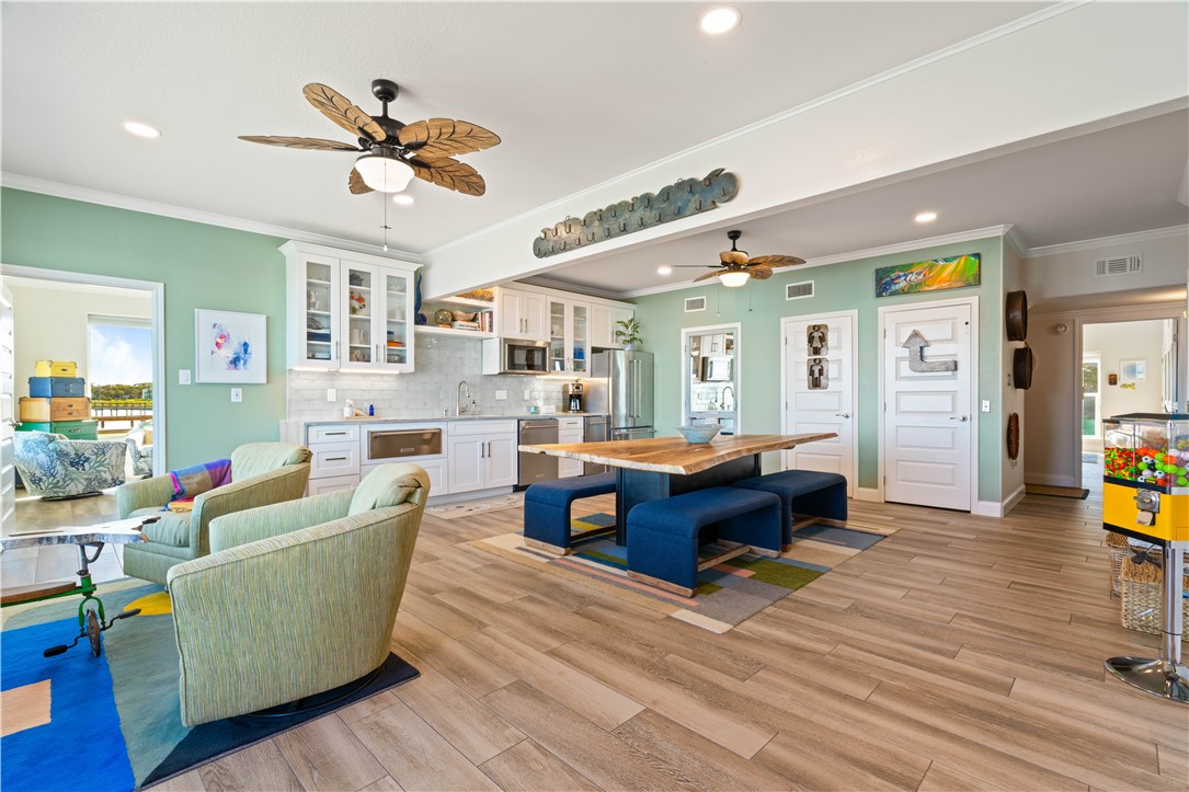 13 Sea Shell Shores Rockport, TX 78382 - Photo 30 of 40 a living room with furniture and a wooden floor