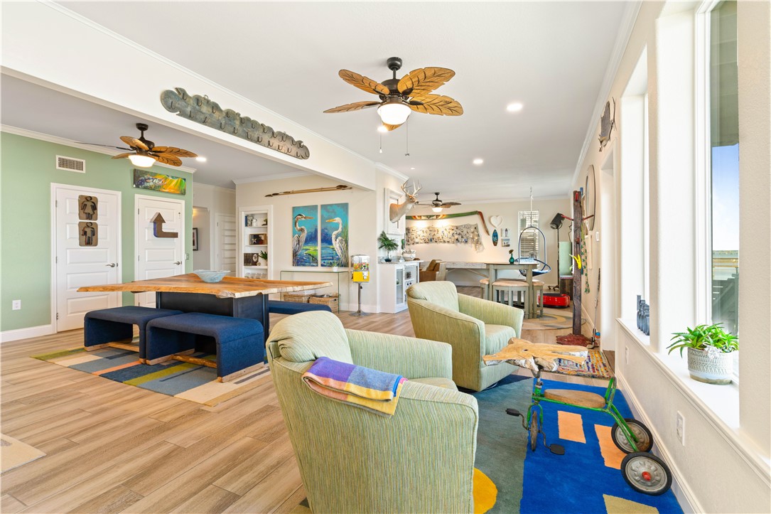 13 Sea Shell Shores Rockport, TX 78382 - Photo 32 of 40 a living room with furniture and a wooden floor