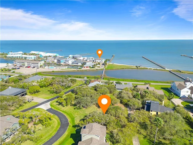 a view of swimming pool with a yard and outdoor seating