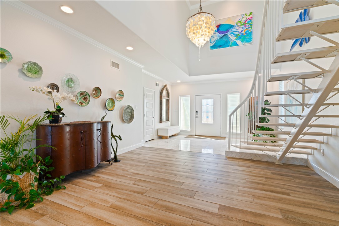 13 Sea Shell Shores Rockport, TX 78382 - Photo 10 of 40 a view of an entryway with wooden floor